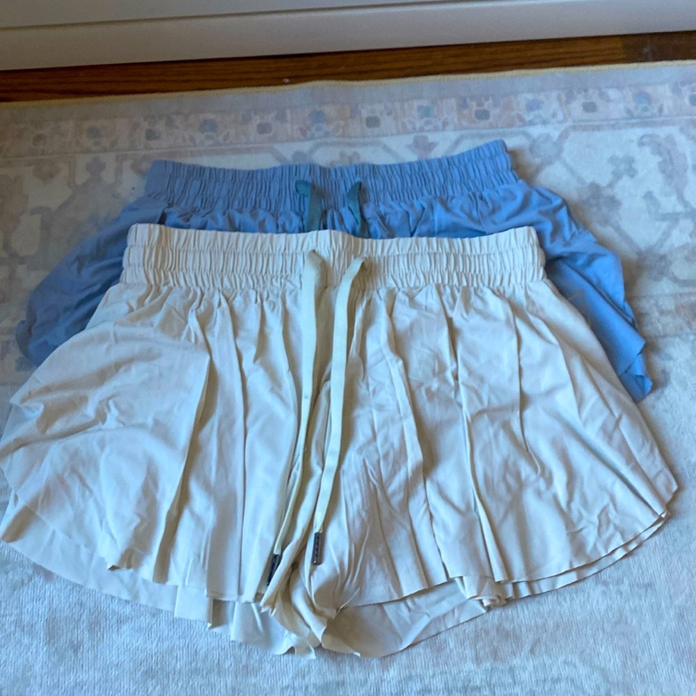 Two pairs of butterfly shorts